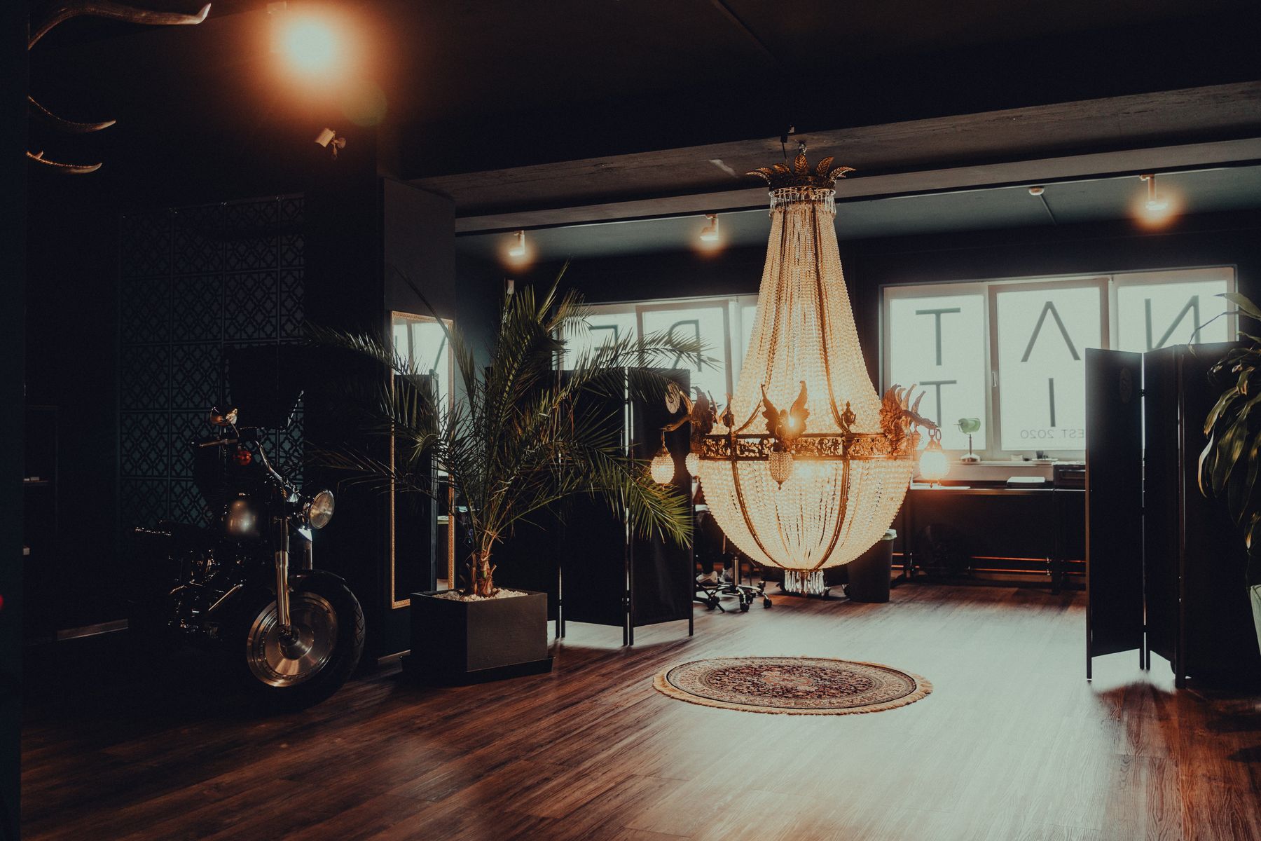 Warm, editorial tattoo studio interior used in this template demo